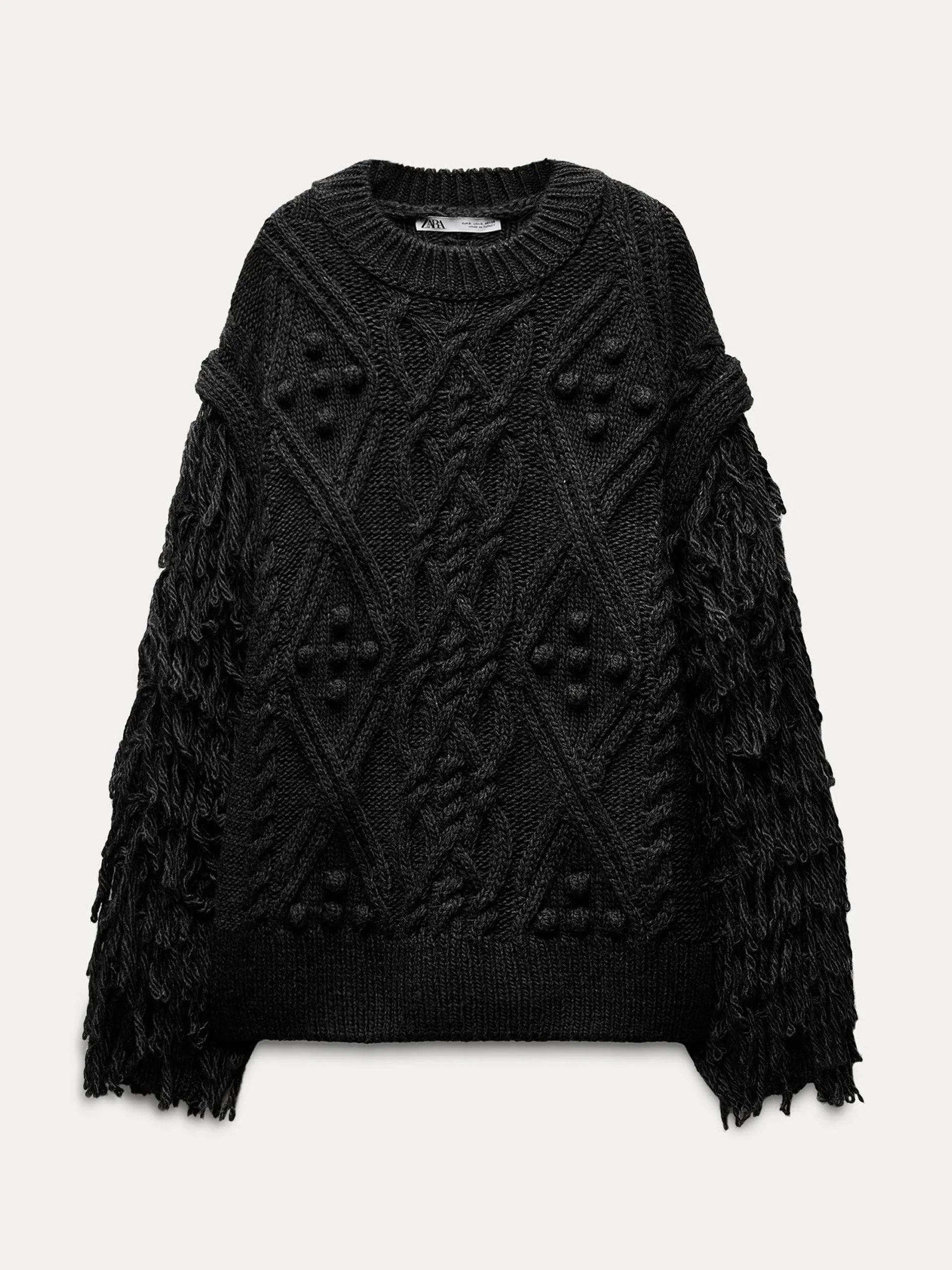 Fringed knit sweater